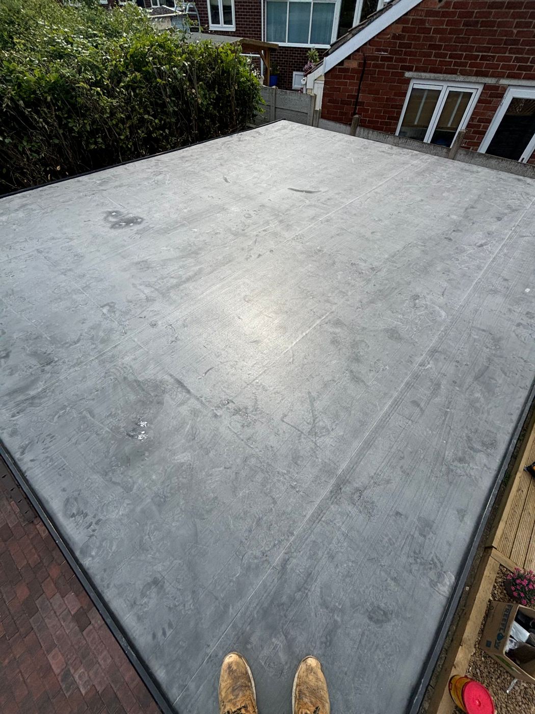 Completed flat roof with clean watertight finish