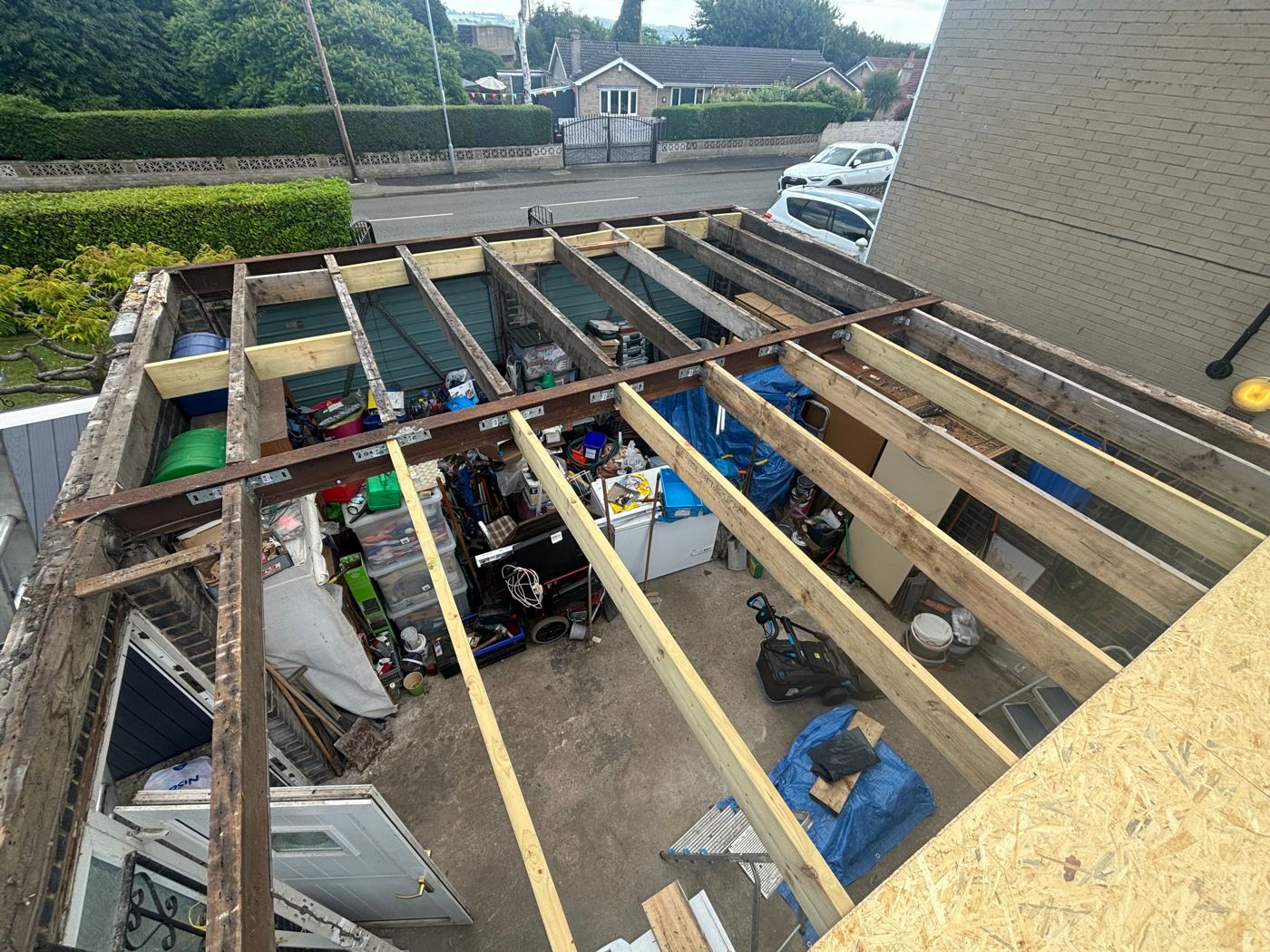 New structural timber joists during roof construction