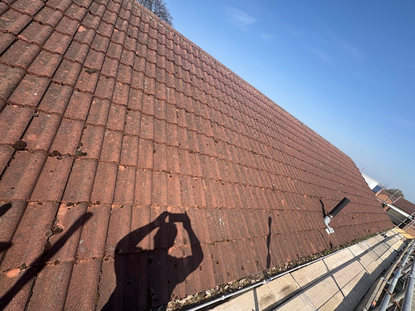 Cleaned and repointed red clay tile roof